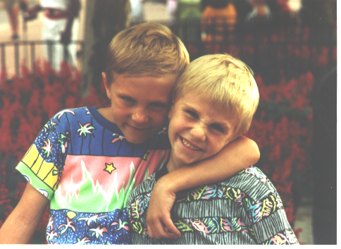 Lee and Scotty hugging